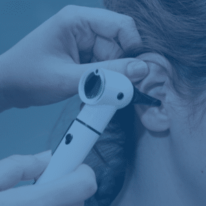 doctor looking in an ear