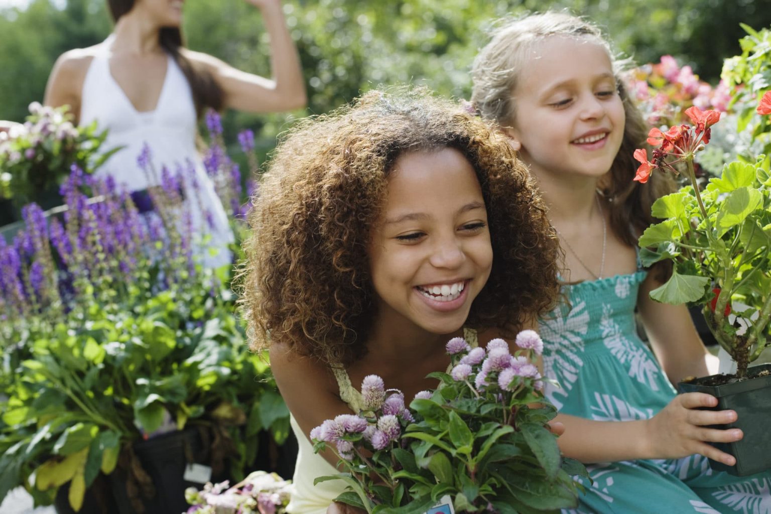 Two children in a garden about to experience allergy symptoms