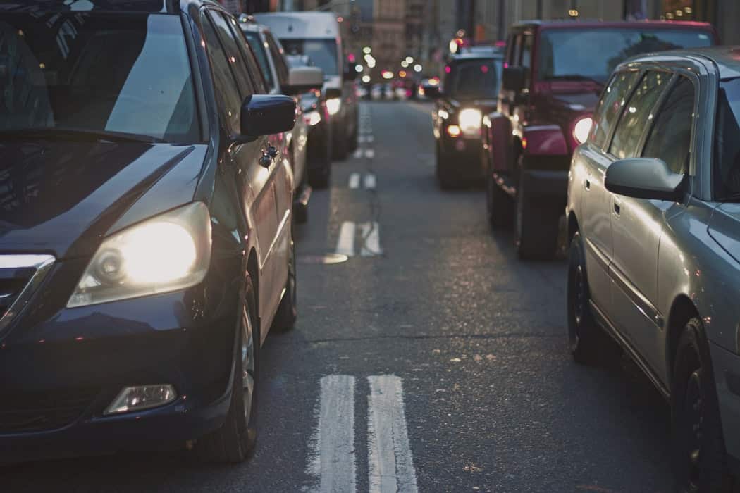 Cars piled up in city traffic.