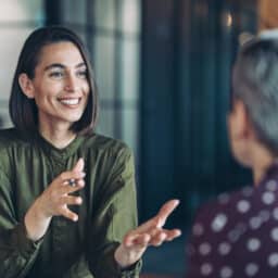 Woman talking with her coworker