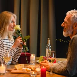 Happy couple celebrating valentine's day at home